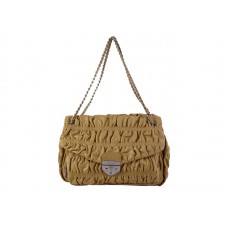 Torba na ramię Prada Embossede Nappa Leather w kolorze musztardowym